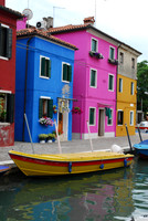 Blue Burano with Yellow Motorboat