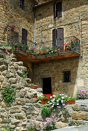 Stone House with Balcony of Flowers