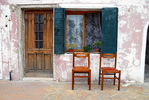 Green Shutters with Lace Curtains